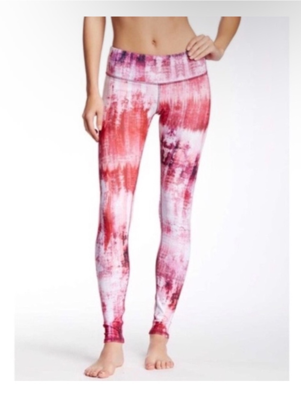 Alo Yoga Airbrush leggings in a pink Desert Sunset print.